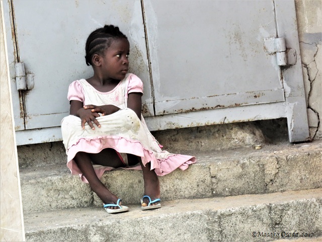 Girl sitting on the steps, Monrovia, Liberia, April 2017