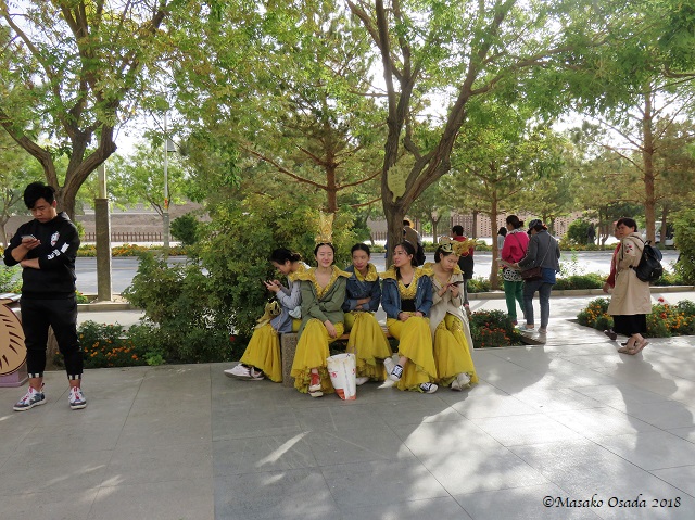 Dancers. Mingsha Mountain Crescent Spring Resort, Dunhuang, Gansu, September 2018