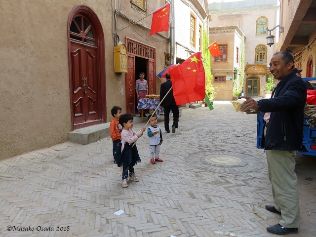 Young patriot? Old City, Kashgar, Xinjiang, September 2018