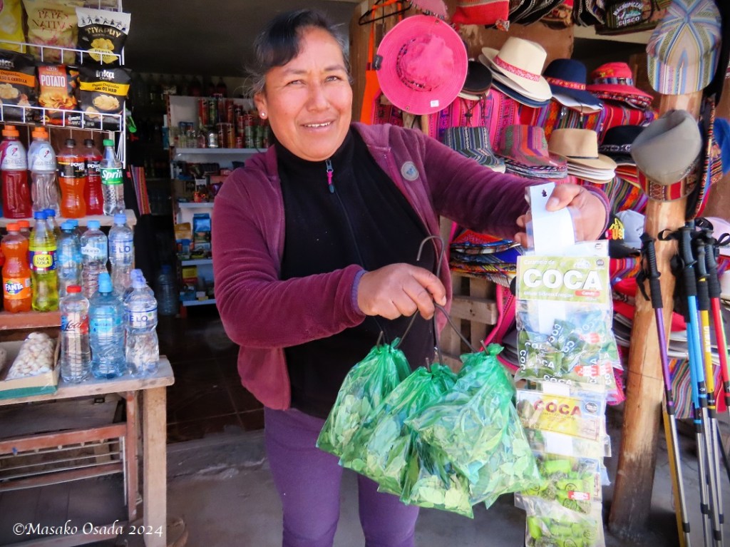 Woman selling coca leaves and coca candies. Pisac